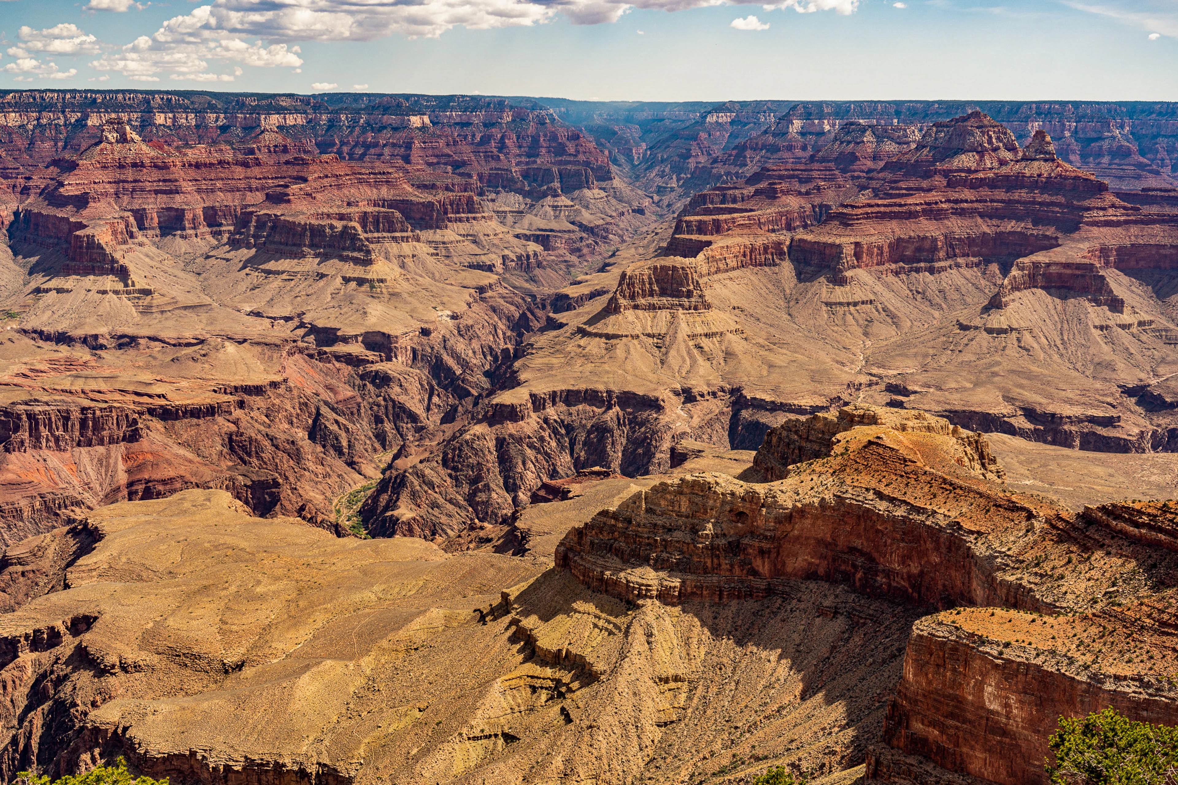 A wide daylight view across the Grand Canyon